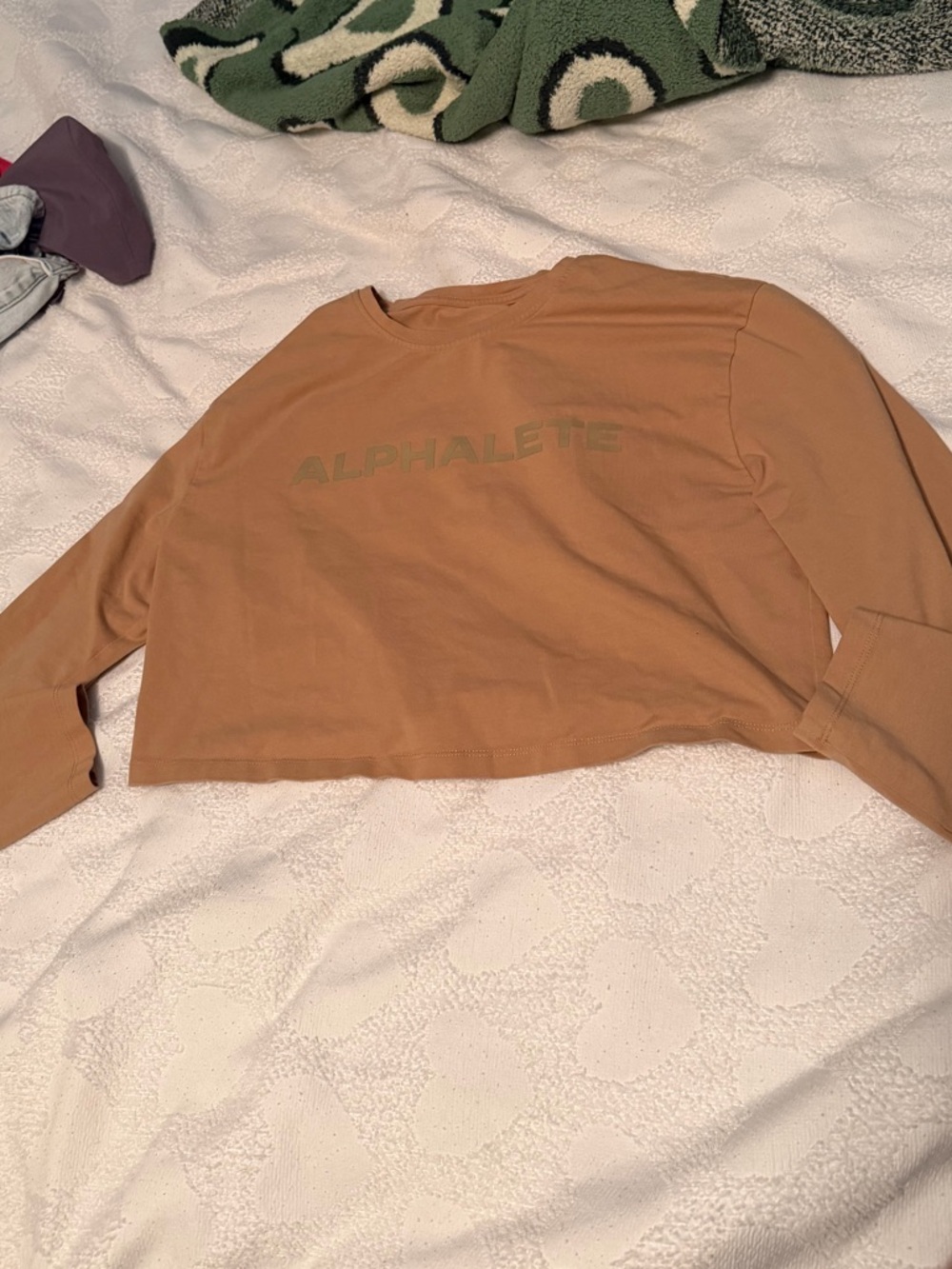 Alphalete Cropped Long Sleeve Tee in Tan